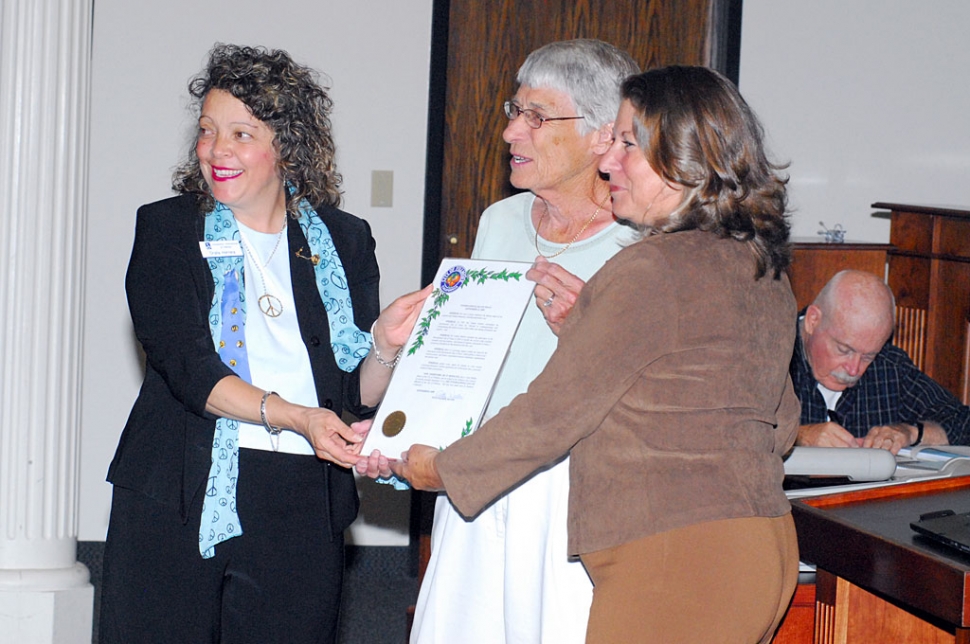 Mayor Patti Walker, right, presented Oralia Herrera, left, and Sarah Hansen with a proclamation for their service.