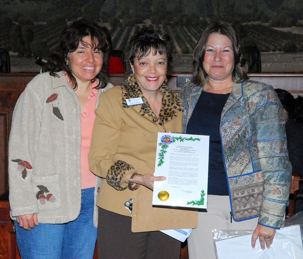 Pictured (l-r) Soroptimists Nora Toledo and Oralia Herrera, with Mayor Patti Walker presenting them with two proclamations.