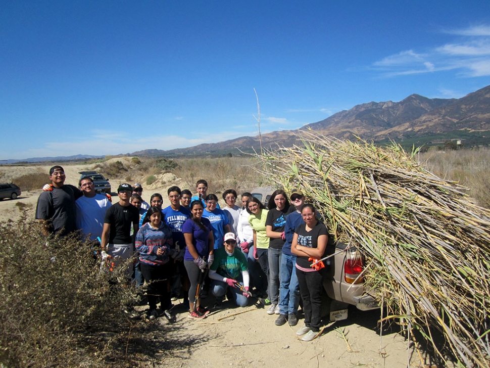 Pictured are Fillmore High and Sierra High School students, participating in the first restoration work party of the Santa Clara River habitat.