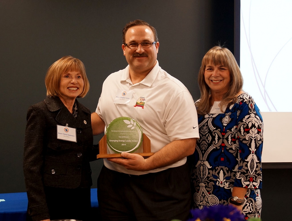 Cheryl Heitmann, VCREA Vice-Chair and City of Ventura Mayor presents the Emerging Energy Leader Award to Douglas Tucker, Mayor of Fillmore, at the Ventura County Regional Energy Alliance (VCREA) 2nd Annual Energy Leadership Reception on January 29th. (l-r) Cheryl Heitmann, Douglas Tucker, and Sue Hughes, Deputy Executive Officer, VCREA. Photo by Gia Allen.