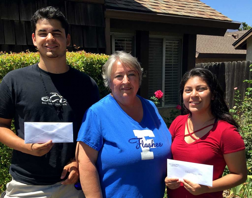 Emilio Hernandez '15 (Chico State), and Patricia Vasquez-Cabrera '15 (UC San Diego) receive their continuation grant award from Scholarship Committee member, and Vice President of the Alumni Assn, Corinna "Chandler" Mozley '71.