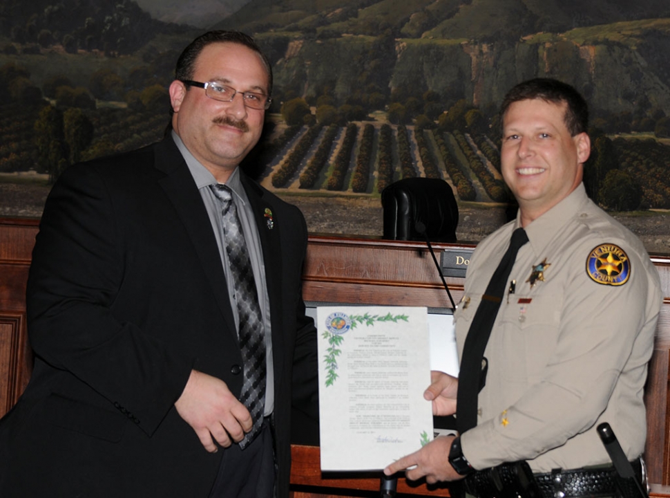 A Proclamation was presented by Mayor Douglas Tucker to Officer Michael Zabarsky for going the extra mile to help a Fillmore family living in substandard conditions.