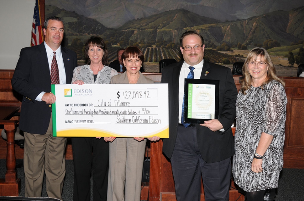 The City of Fillmore was awarded the Platinum Tier Level Status by Southern California Edison (SCE) Energy Leader Partnership Program. A check for $122,098.92 representing the cumulative rebates was paid to the City for completing its energy efficiency projects. Pictured (l-r) are Fillmore City Manager David Rowlands, Annette Cardona, SCE Rep Anna Frutos-Sanchez, Mayor Douglas Tucker, and SCE Rep Sue Hughes.