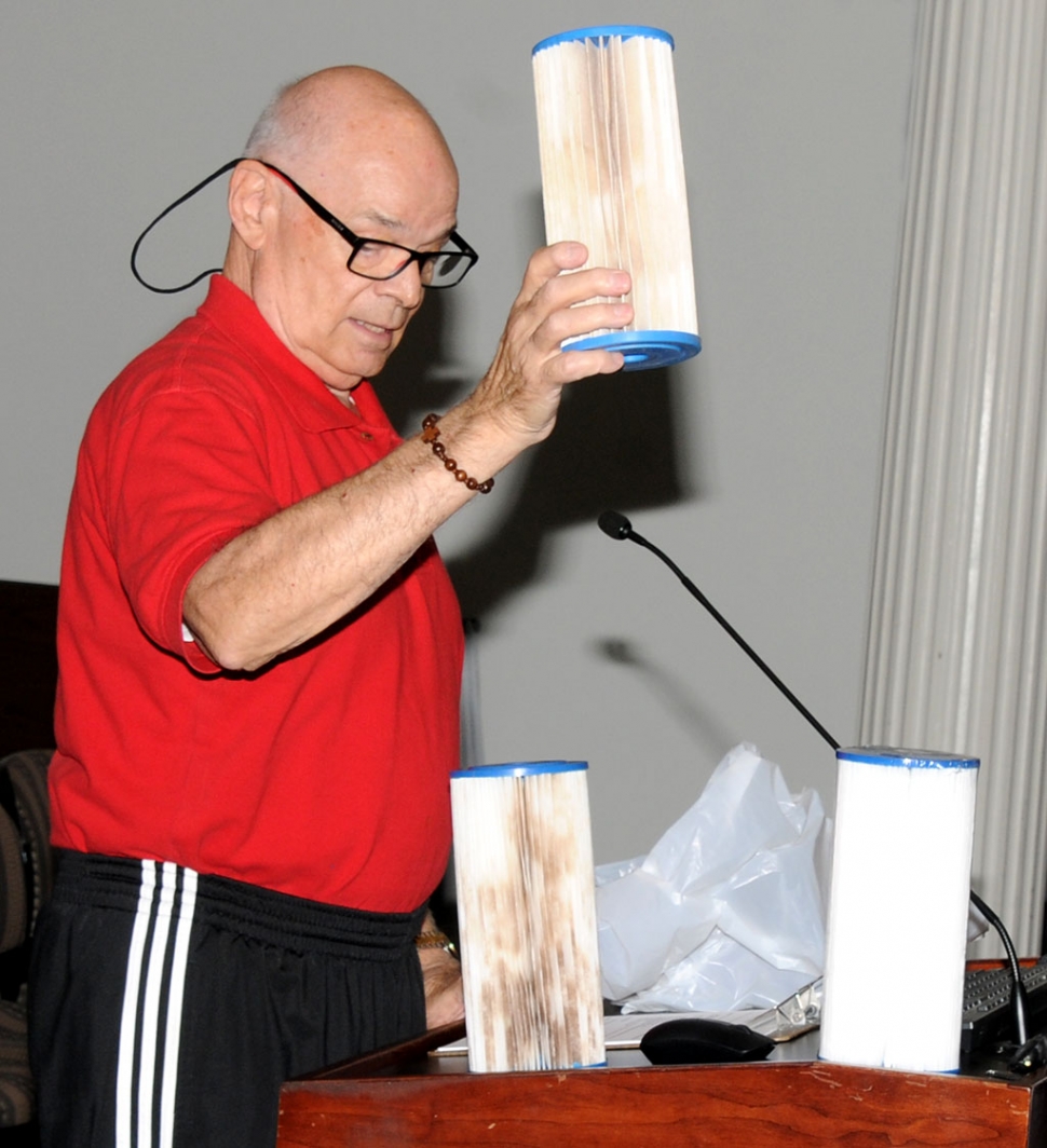 Pictured above is Charles Richardson, resident of El Dorado Mobile Estate Park, holding up one of three dirty water filters at last week’s city council meeting, to demonstrate the issue of poor water quality at the park.
