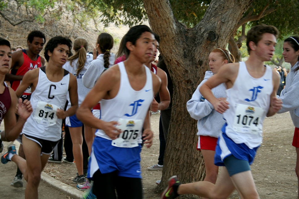 (l-r) Teammates Francisco Erazo and Justin Beach working the first mile loops at Mt. San Antonio College during CIF Prelims.