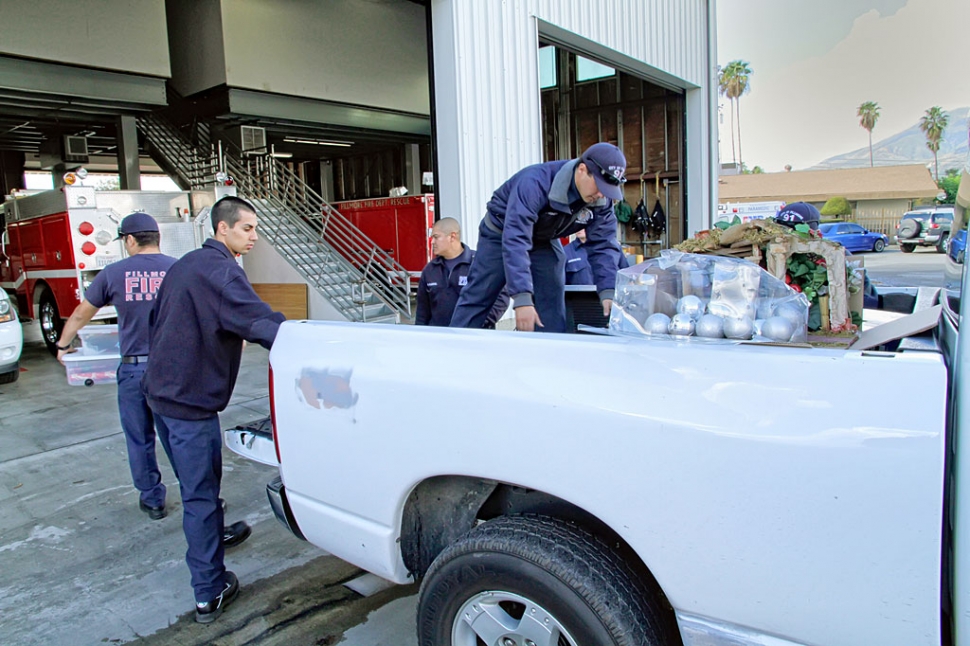 Boxes of Christmas decorative trimmings donated to the Fillmore Fire Department by A Street Self Storage.