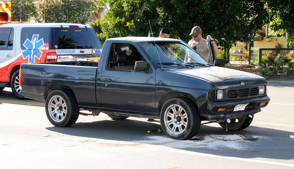 Pictured above is the black older Nissan truck that rear-ended the Toyota 4-door sedan.