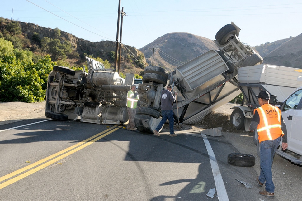 On Tuesday, November 10th at 1:46pm, in the 1700 block of Grimes Canyon Road in Bardsdale, a belly dump truck carrying a full load of gravel, and a grey Toyota Camry collided causing the truck to roll on its side, blocking lanes in both directions. The Camry had severe front-end damage. Cause of the crash is still under investigation. Lanes were to be impacted until possibly 10pm according to the California Highway Patrol.