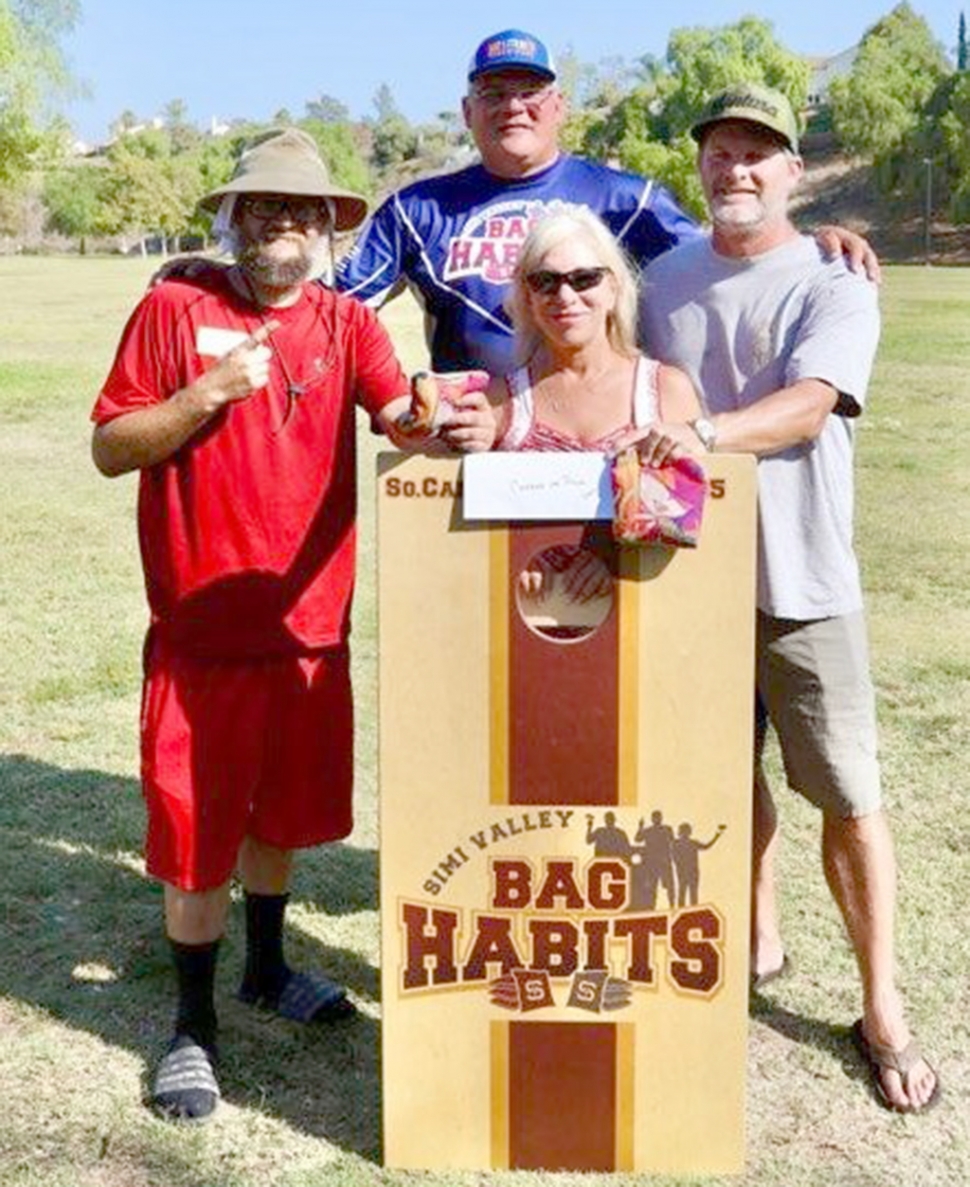 The Dye Scholarship Foundation Day Cornhole Tournament took place on Monday, September 6th and was a huge success, raising over $10,000. Pictured (l-r) are Dustin Parkins, Sandy Dye, Jerry Lopez and Lucio Pertile. Dustin and Lucio took first place in this year’s tournament.