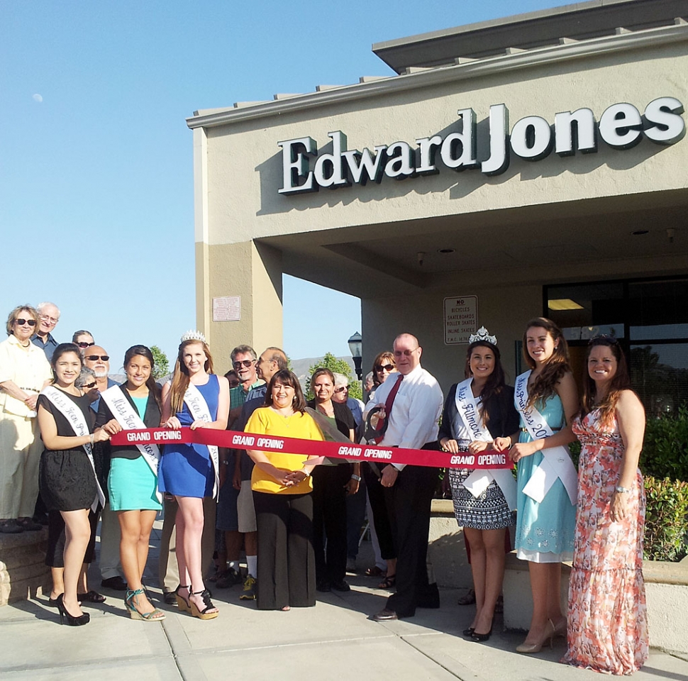 Pictured is the Grand Opening of the new location for Edward Jones, in the Vons Shopping Center complex. The Chamber of Commerce was represented by Ari Larson, Miss Fillmore Samantha Parker and her Princesses, Kyle Wilson, Cindy Jackson and Linda Vazquez.