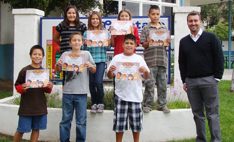 Paul Capra of John Paul Pet with upper grade award winners from San Cayetano for the month of October.
