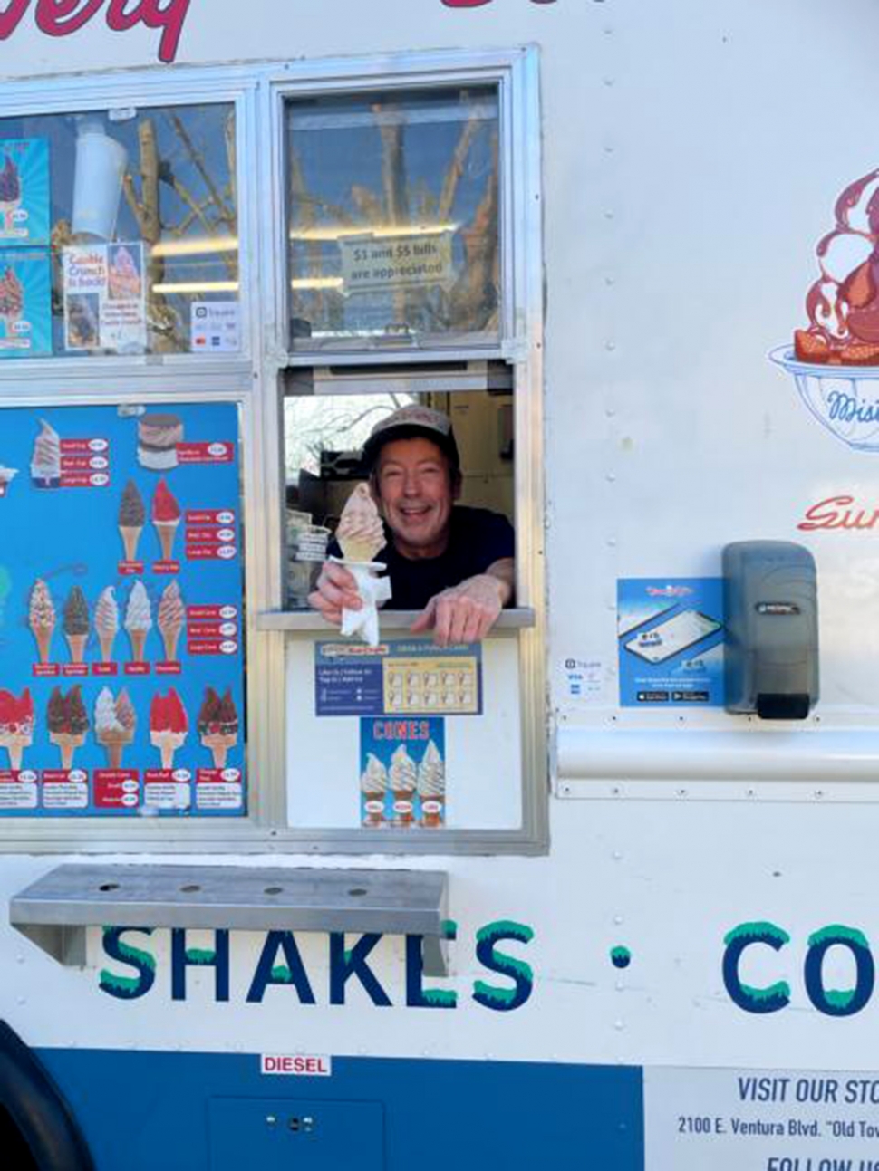 Fillmore’s Jay Morrissey, AKA Mr. Softee, is all smiles handing out a tasty cone. Photo credit Carina Monica Montoya.