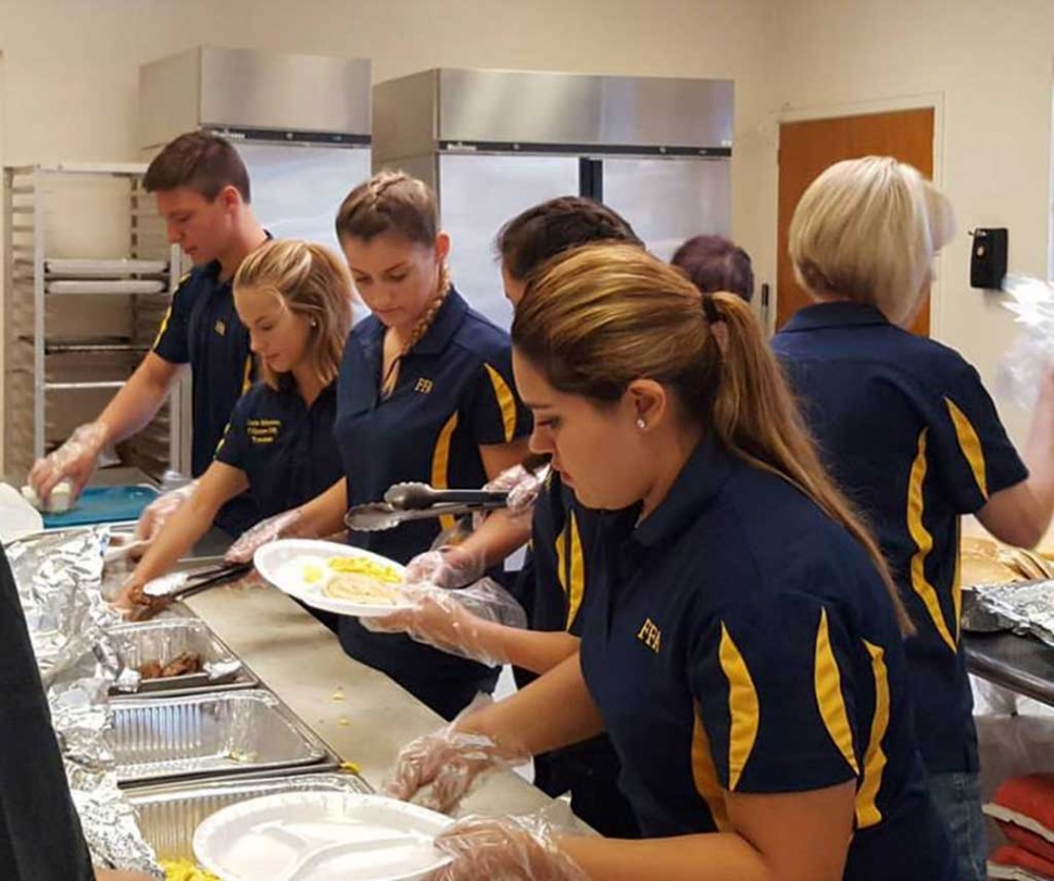 On Saturday, May 20th Fillmore FFA hosted their Annual May Festival Pancake Breakfast at the Veterans Memorial Building. Pictured above are FFA Students working hard the kitchen during their annual fundraiser.