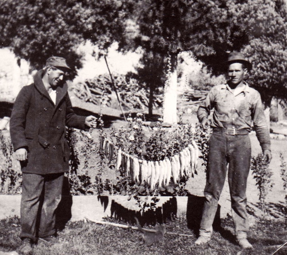 (right) Charlie Brown. Fishing catch, circa 1930.