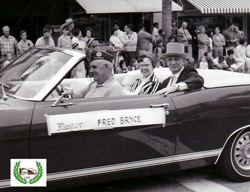 Mayor Fred Bryce, local CPA and captain of the Police Auxiliary, with Ruth Bryce in May Festival Parade. 
