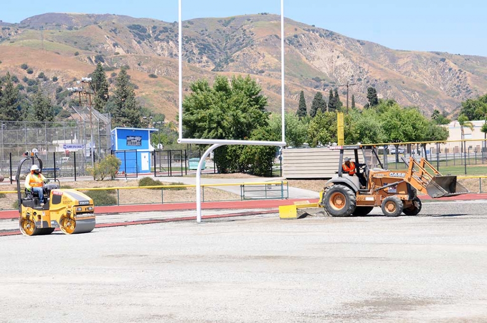 The Fillmore School District has undertaken the resurfacing of the high school football field turf as one of its summer construction projects.