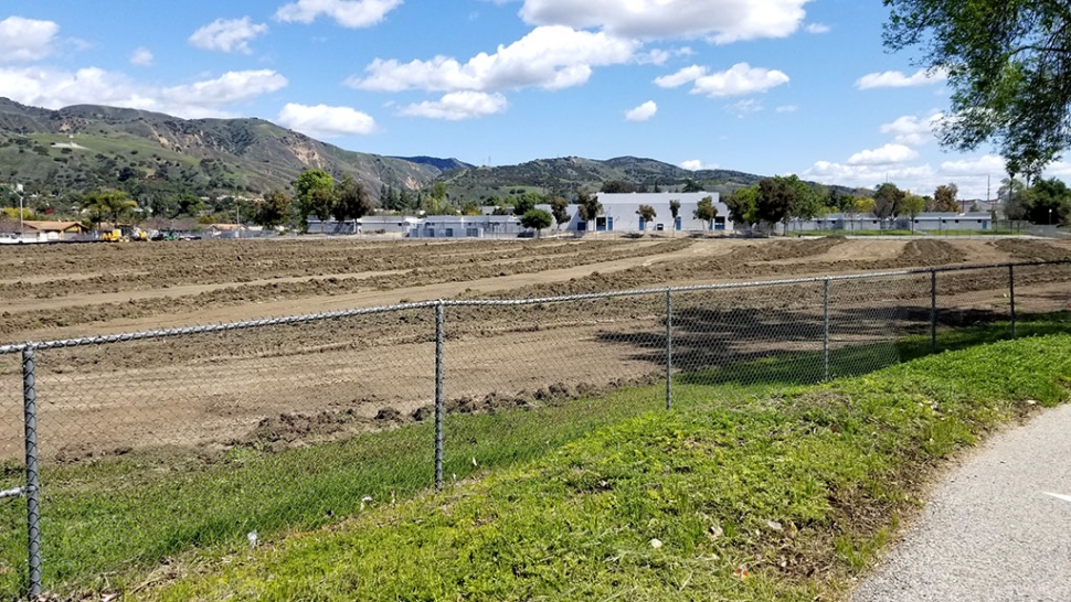 Pictured is the back of Fillmore Middle School where crews have started construction on the improvements to the baseball and soccer fields. Courtesy Fillmore Unified School District.