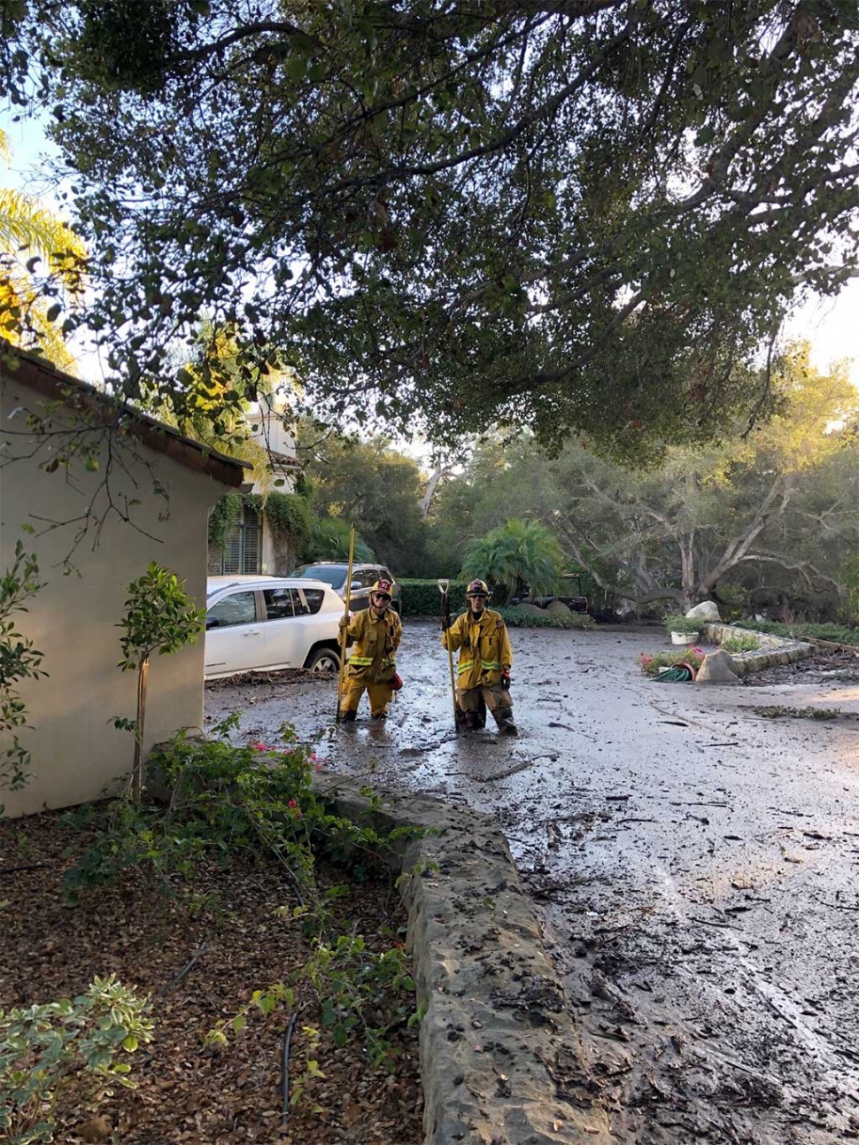 After the deadly mudslide in Montecito occurred last Tuesday morning, Fillmore’s Engine 91 was requested to be part of a mix strike team along with Federal Fire, Ventura City Fire, Oxnard Fire, and Santa Paula Fire. Fillmore Fire Fighters Claire Morgan and Jordan Castro (pictured above) were up to their thighs in mud outside a home in the Montecito area.