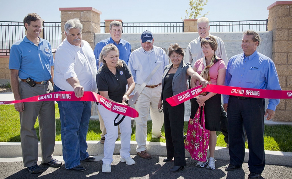 It’s Official! The City of Fillmore celebrated the official Open House of the Water Recycling Plant on May 22. Cutting the ceremonial red ribbon are (l-r) Director of Public Works engineer Bert Rapp; Councilman Steve Conaway; Mayor Patti Walker; John Wyckoff, P.E. Kennedy Jenks Consultants--Lead Design Engineer for the Plant; Mark Strauss, President American Water, Prime Contractor and Operator of the Plant; Councilwoman Laurie Hernandez; Stan Simons, President W.M. Lyles, Construction Contractor; Fillmore City Manager Yvonne Quiring; Glen Hille, P.E., AECOM, Program Manager.
