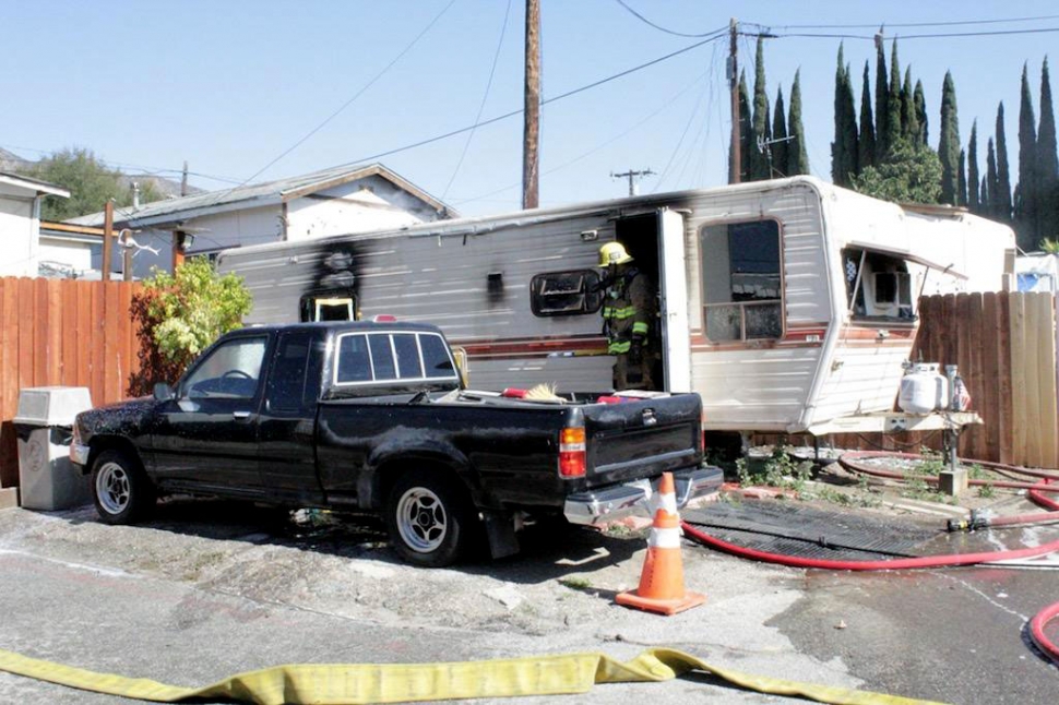 Mobile Trailer Fire at Fillmore West
On Sunday, March 21st, at 10:14am, VCFD, Fillmore Fire Department and Ventura County Sheriff’s Department were dispatched to a structure fire located at 1906 Old Telegraph Road (Fillmore West). Arriving fire crews reported a mobile trailer on fire and upgraded the call to a working fire with a black truck next to and with other trailers in the area. Fire crews reported no one inside the mobile trailer. Fire was knocked down at 10:30am. Ventura County Sheriff’s Department assisted with traffic control. Fire crews were on scene for about two hours. One ambulance was dispatched to the scene for minor burn injury. Condition unknown. Cause of the structure fire under investigation. Main photo courtesy Angel Esquivel-AE News. Inset courtesy Ellie Rosales FB page. A Go Fund Me page has been set up to help the family. See to Go Fund Me and search Help Replace Their Home Fillmore. Nathalie Lomeli is organizing this fundraiser.