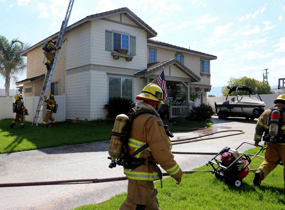 Fillmore, Ventura County and Santa Paula Fire Departments responded to a structure fire in the 900 block of Aerosmith Lane in Fillmore. Upon arrival crews found smoke coming from what seemed like the attic. Upon entry the first crew found smoke coming from the master bedroom and a lamp and bedroom content on fire. Cause of fire is under investigation. Crews were on scene for about 40 minutes. Photos courtesy Fillmore Fire Department.