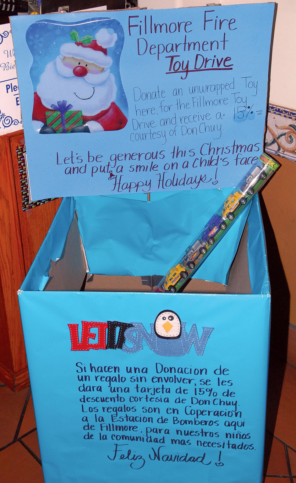 A toy box is available at El Pescador, collecting toys for the North Fillmore Police Storefront giveaway. The restaurant will give a 15% discount to anyone who brings in a new toy worth $10 or more for the drive.