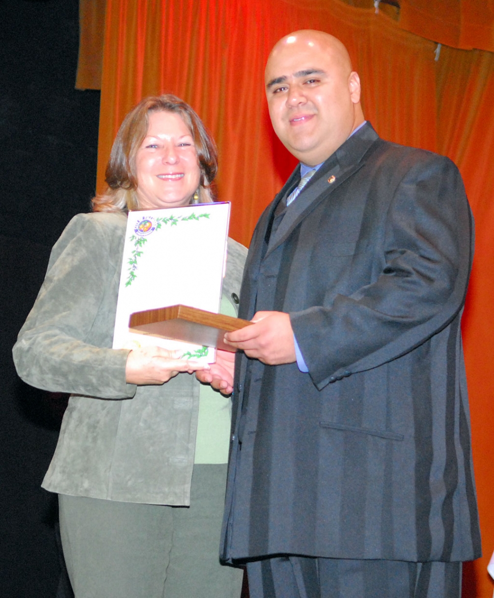 Firefighter of the Year Abner Puebla and Mayor Patti Walker.