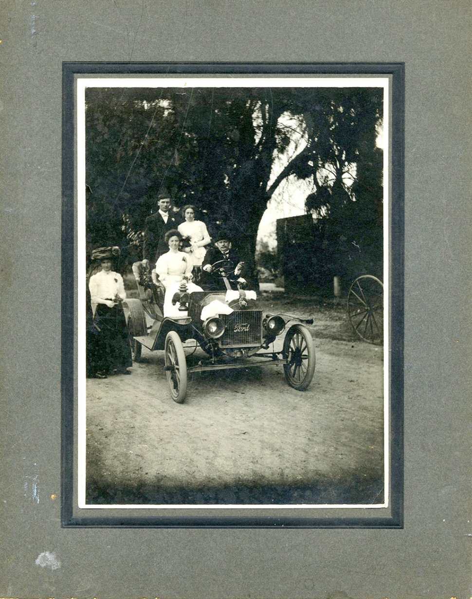 Dr. Hinckley's first car with wife Fannie (c) 1909.