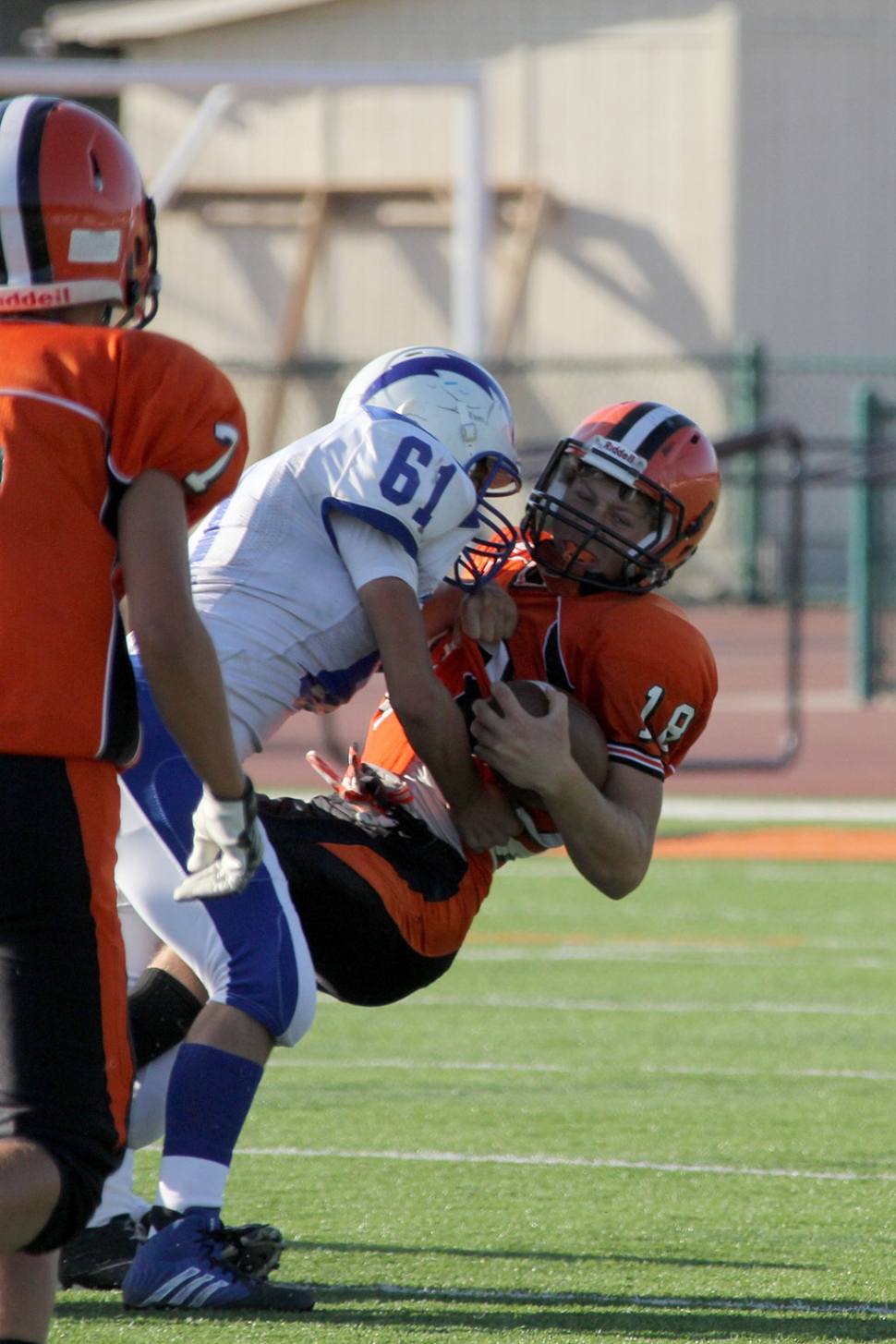 J.V. #61 Cody Isaacs making a tackle in the back field