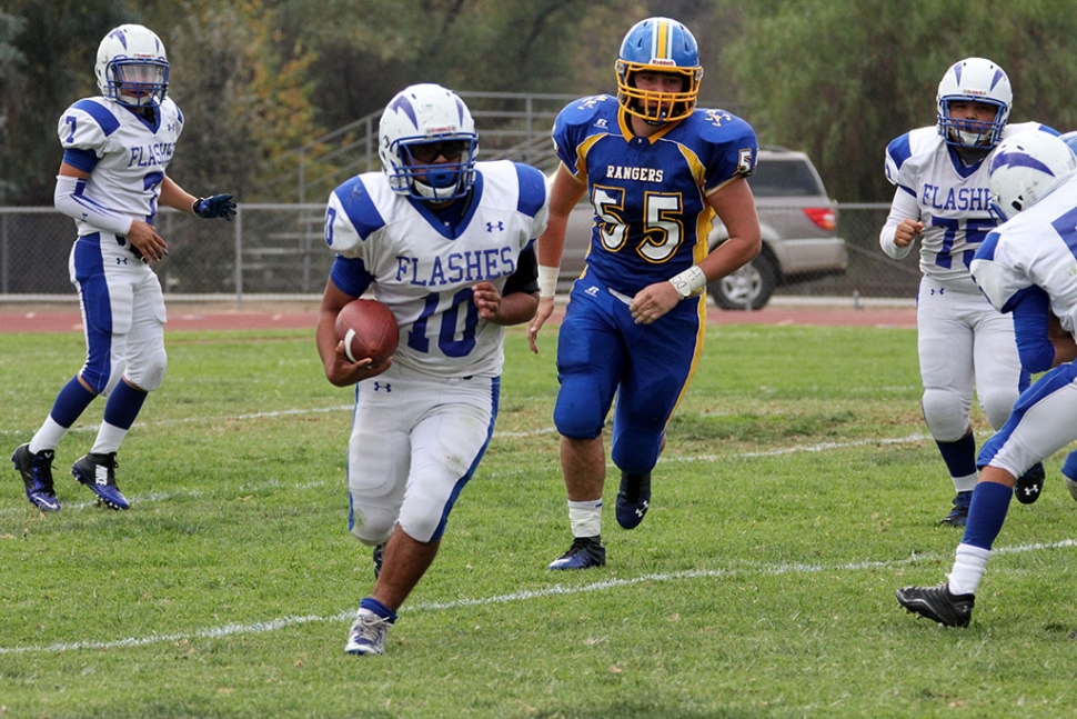 J.V. #10 Daniel Tafoya runs for a first down