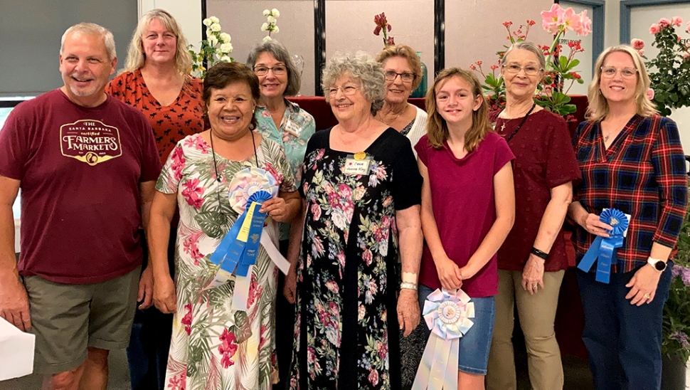 (l-r) Mark Ortega, Amy Berger, Bene Ambrosio, Linda Nunes, Joanne King, Michelle Smith, Lauren Berger, Jan Lee, and Coleen Chandler.