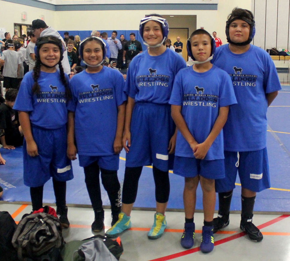 Pictured left to right are Fillmore Middle School Wrestling Team participants Alexa Martinez, Emma Torres, Meya Garcia, Devin Camacho, and Jonathan Patino after the Takedown Tournament. Photo Courtesy Head Coach Michael Torres.Submitted by Head Coach Michael Torres. The Fillmore Middle School Wrestling Team recently competed at Isbell Middle School’s Annual Takedown Tournament on Thursday, September 13th. The team was led by 6th graders Jonathan Patino and Emma Torres who were both undefeated with records of 2-0 as each of them compiled 4 takedowns. Meya Garcia (grade 8) was 1-1 with 3 takedowns. Alexa Martinez was 1-1 with 2 takedowns. Devin Camacho (grade 6) was 0-2 with 1 takedown. The team will travel to Fremont Middle School on Wednesday, September 19th for a 4 team dual tournament.