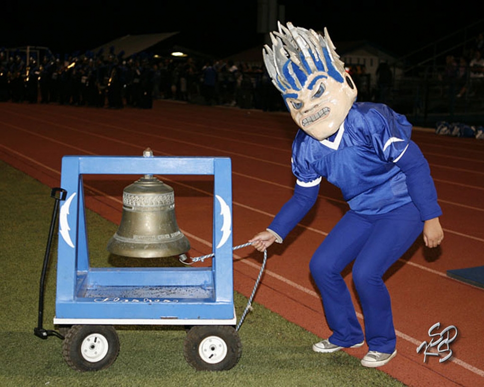 FHS Flashman rings the bell after the Flashes scored a touchdown. Courtesy KSSP Photographic Studio.