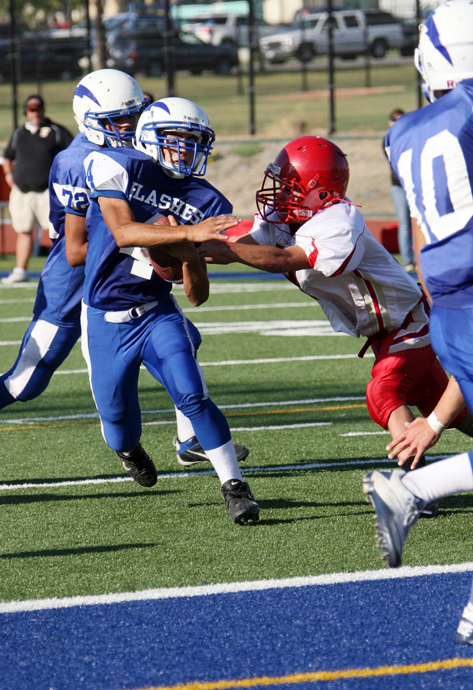 Edwin Baton #4 avoids being tackled and scores for the Flashes.