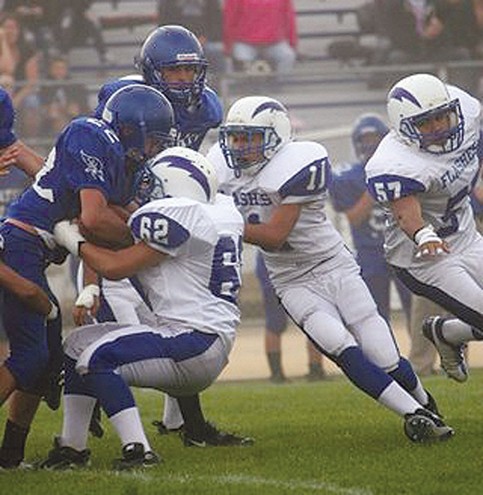 Alex Cervantes #62 and Felipe Cortez #71 work together as a team.