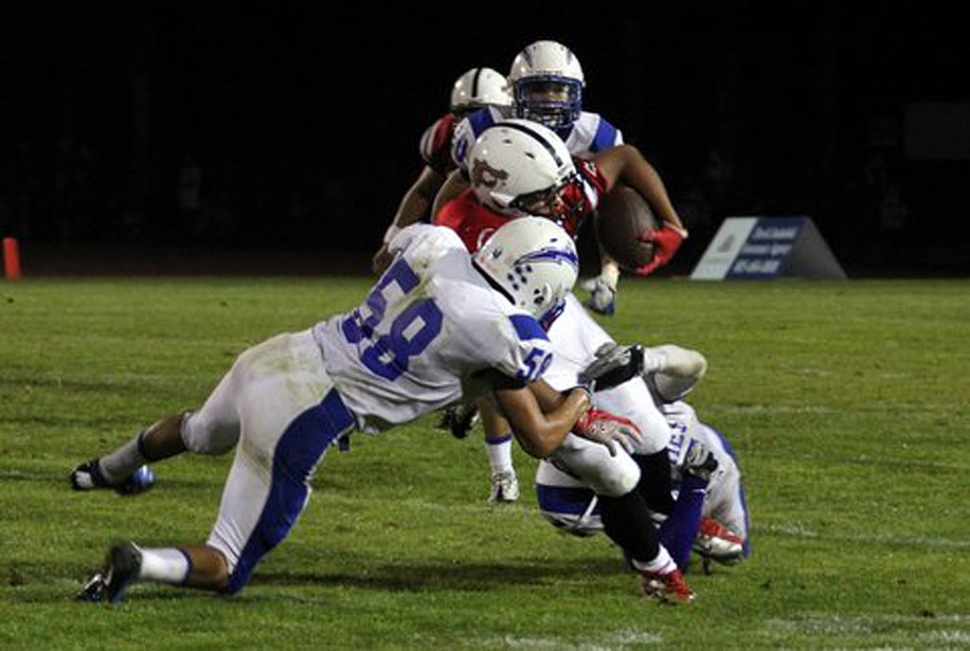 Jeremy Martinez #58 tackles Carpinterias runner during last Friday’s game. Martinez has 44 tackles along with 18 solo tackles.