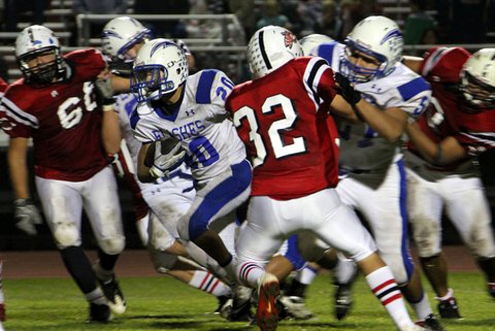 Adam Jimenez #20 runs the ball through Carpinteria’s defence.