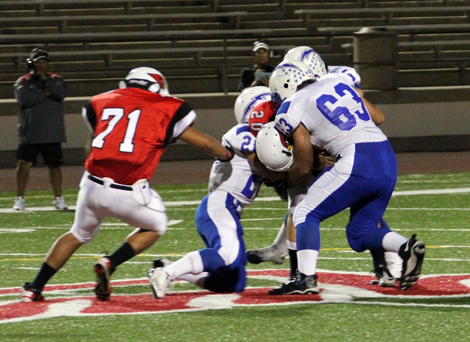 Brandon Pina #63 and Johnny Golson #20 stop a Cardinal from running the ball. Golson had 11 tackles. Collin Farrar rushed for 80 yards. 


Fillmore JV 48 - Bishop Diego 20 - Fillmore's offense exploded for over 400 yards of total yards, led by Adam Jimenez who rushed for 15 times for 175 yards and 4 TD's and 2 two point conversions. Eddie Cardenas rushed 8 times for 126 yards and 1int conversion. Andrey Sanchez rushed also had a solid performance rushing for 45 yards, his lead blocking gave chances for the other backs to have big nights running the ball. The scoring was capped of by quarterback Carson Mclain who rushed for 2 TD's of his own. The Defense countinued its streak of creating turnovers when Joseph Magana and Alex Cervantes inshop Diego quarterback to stop stall the cardinals drives into the Flashes territory. The flashes are now 5 - 0 heading into their next game.