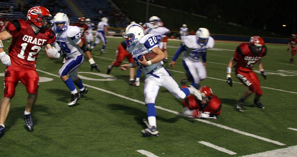 Johnny Golson #20 avoids being tackled by the Lancers Friday night. Golson attributed one touchdown and rushed for 98 yards. Nick Paz rushed for 128 yards and Zach Golson rushed for 107 yards. Fillmore’s total yards on offense was 497.