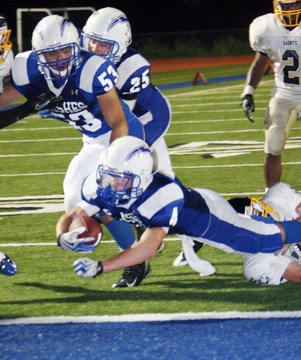 Collin Farrar #4 dives into the end zone for a touchdown. Also pictured Sammy Orozco # 53 and Austin Davis #25. Davis, had 10 tackles five of those were solo and an interception. Corey Cole passed for 176 yards and two Touchdowns. Nick Paz had 15 carries for 71 yards. Johnny Golson had two key interceptions and a rushing touchdown.