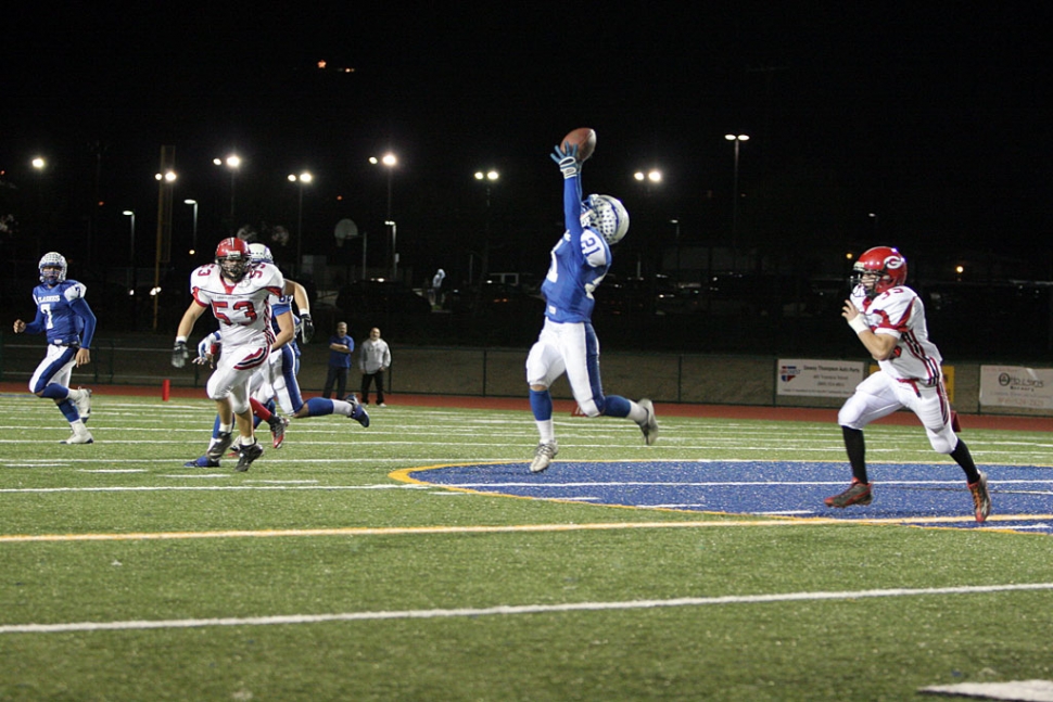 Nick Paz catches the ball with the tips of his fingers and runs for a few yards. Fillmore played against Grace Brethern Friday night and beat them 49-46. Paz had over 150 yards rushing and Nathan Ibarra passed for over 150 yards. Christian Prado had 21 tackles. According to Coach Dollar, “This was a big game for the team and they played big.”