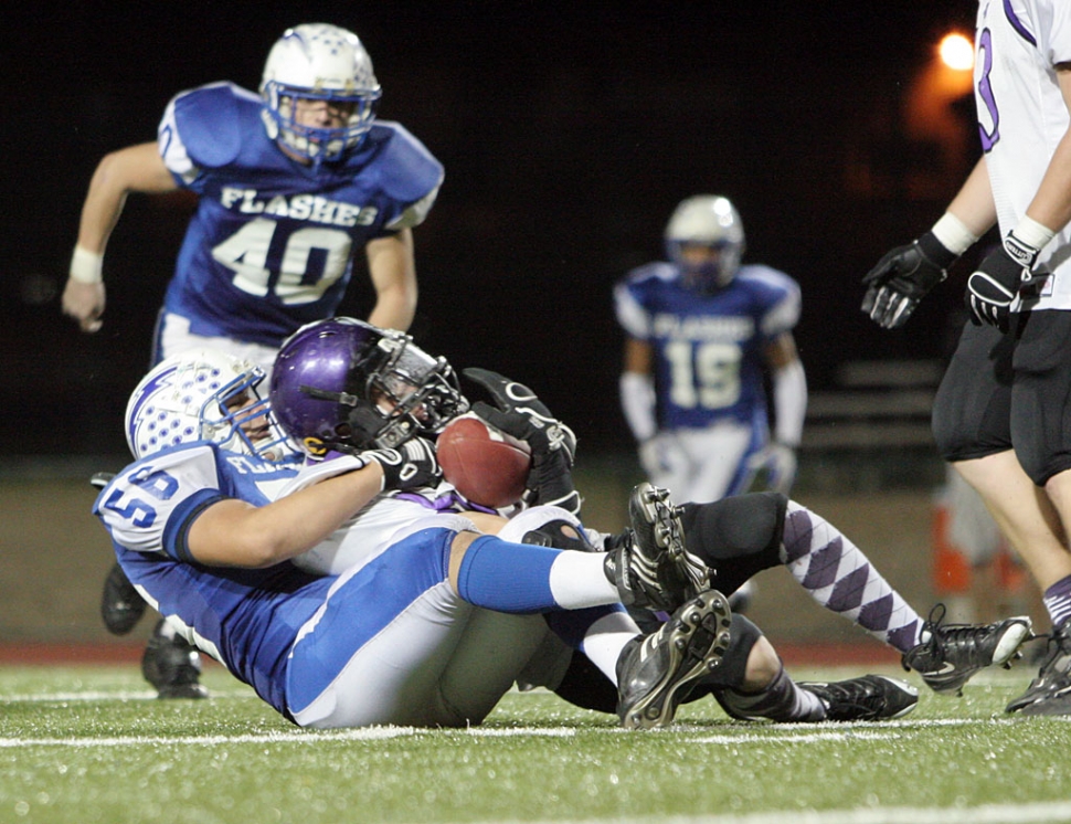 David Esquivel brings down the Scorpions running-back.