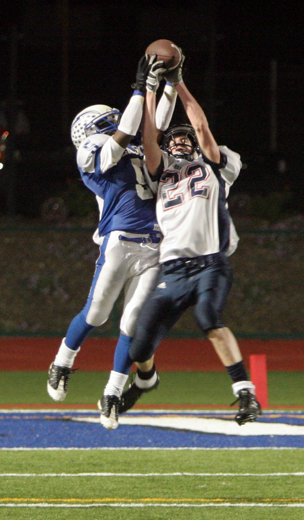 Troy Hayes jumps up and intercepts the ball against Brentwood last Firiday. This interception was a key play in the 4th quarter.