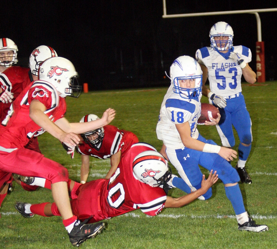 Robert Bonilla #18 runs around the outside and tries to avoid the tackle. Fillmore played at Carpinteria last Friday, and lost 15-46. Nick Paz had a 55 yard interception for a touchdown. Paz and Collin Farrar both rushed for 70 yards. Corey Cole had 5 solo tackles, Alex Gaspar had 10 tackles and Derek Luna had 12 tackles. “It was a tough loss, Carp had a good team with a great offensive line and they took it to us,” said Coach Dollar.