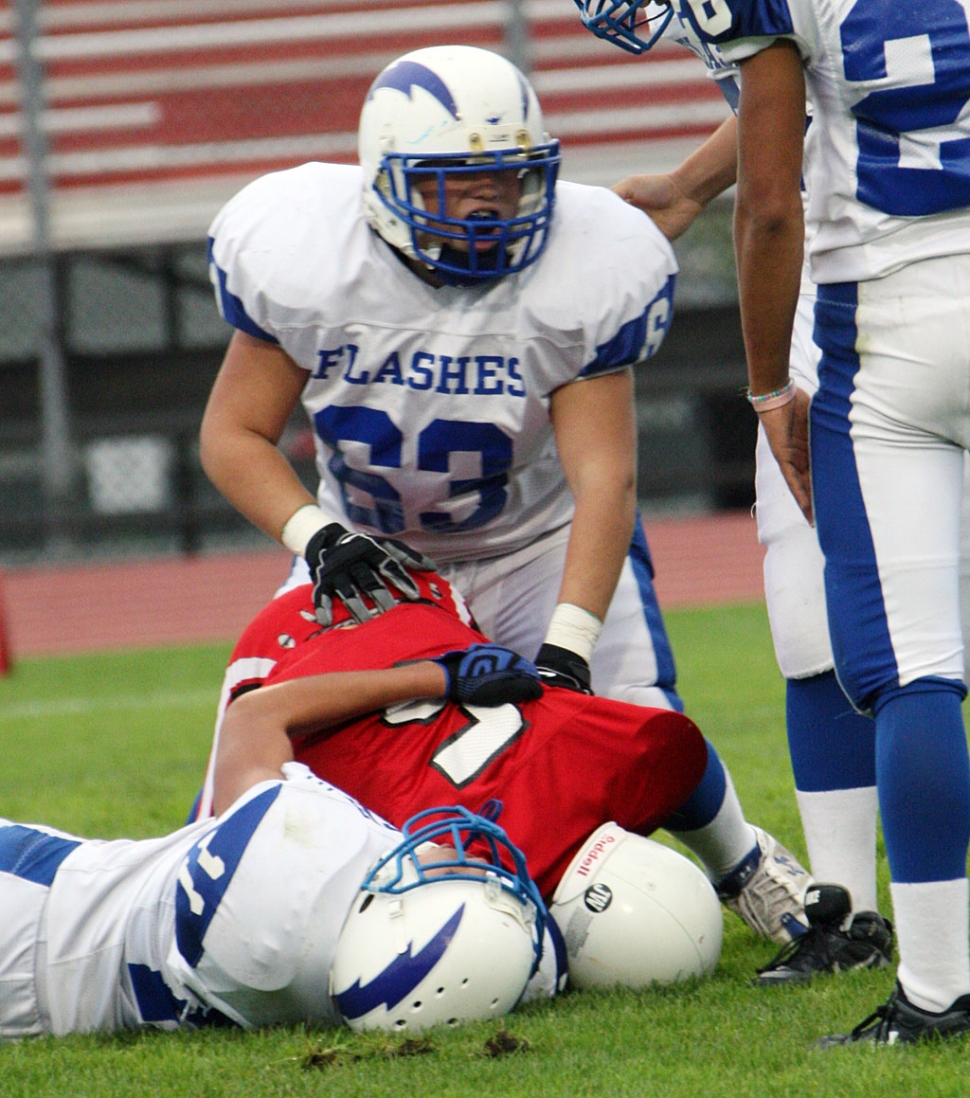 Brett Edwards gets up after helping out with the tackle against the J.V. Carpinteria team. J.V. lost 28-7.