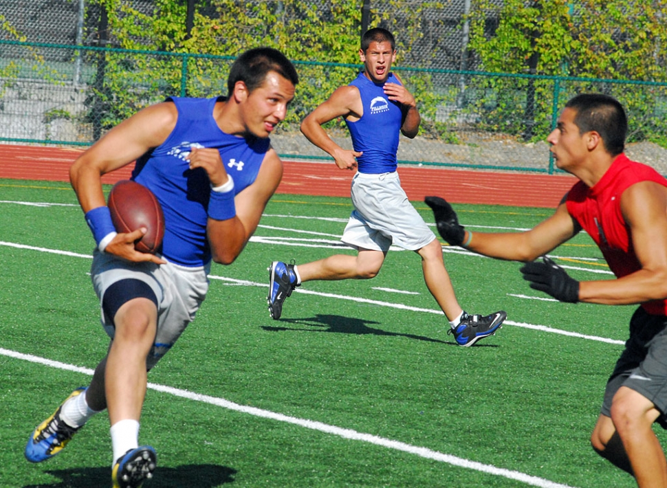 Austin Davis tries to avoid contact to gain a few yards.