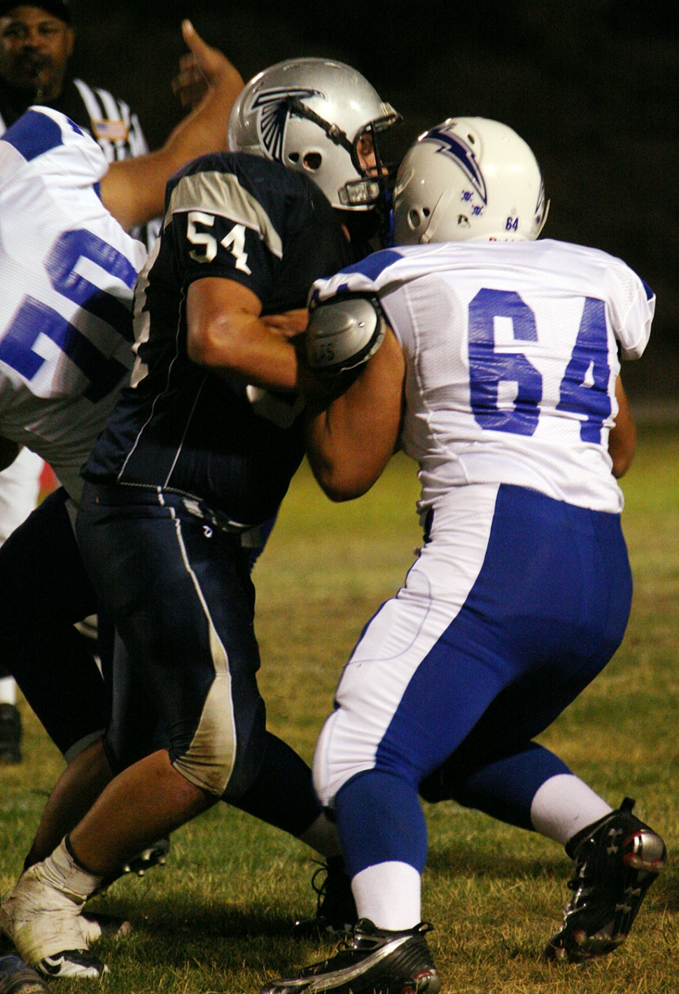 Brandon Pina #64 holds off Frazier Park’s defense last Friday night.