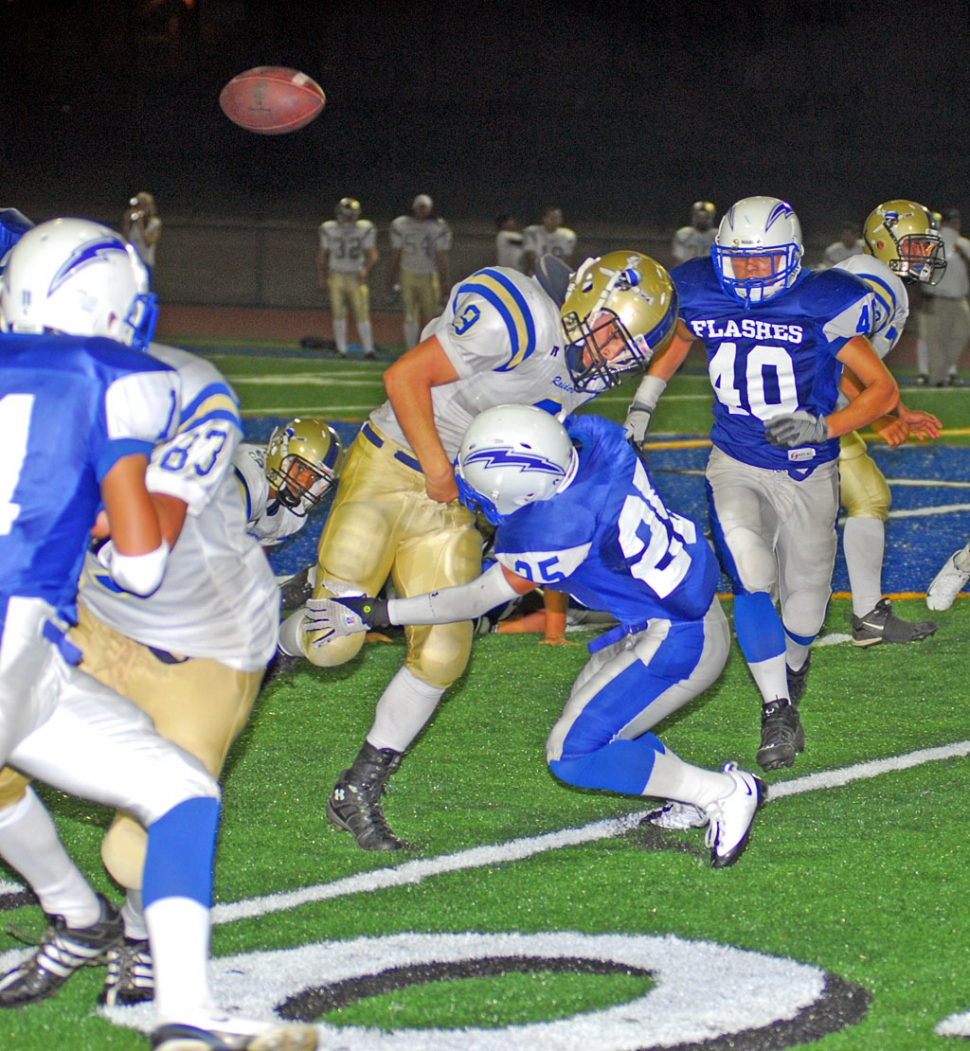 Troy Hayes had over 150 all-purpose yards and four touchdowns including a 66 yard punt return for a score, to lead the Flashes past the Channel Island Raiders. Ralph Sandoval #25, pictured above, caused a fumble in the 3rd quarter that was recovered by Marco Herrera, a key turning point in the game. Christian Prado led the defense with 11 tackles. “The team did exactly what was required of them in the second half, they didn’t allow another score and they put twenty points on the board for the go-ahead win,” stated Coach Dollar. Fillmore beat Channel Islands 27-20.