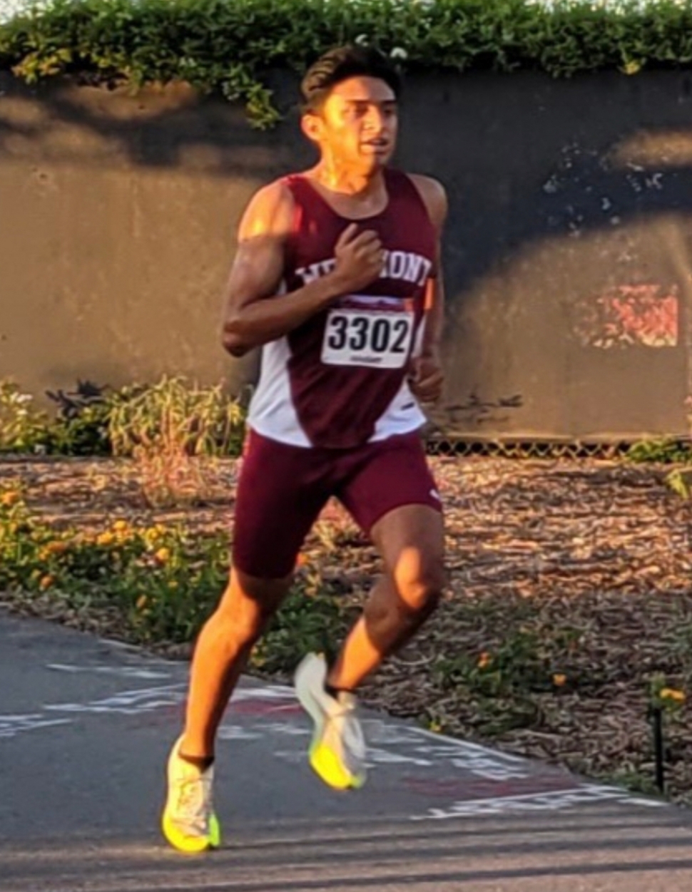 Former Flash Rey Laureano as he competes at Apalachee Regional Park in Tallahassee Florida for Westmont Cross Country. 