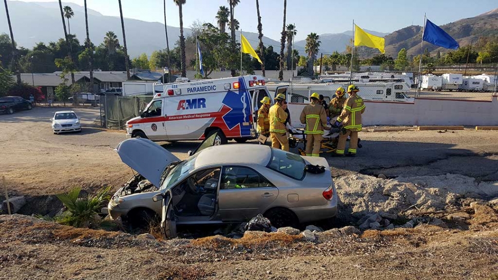 Shortly after 6pm on Monday, July 18th fire crews from Fillmore Fire Department heard a loud noise outside of the station. Firefighters went outside to investigate and found a car that ran off Sespe and landed near the labor camp housing. Single male occupant transported to the local hospital for evaluation. Accident investigation was turned over to the Fillmore Police Department. Photo courtesy Sebastian Ramirez.